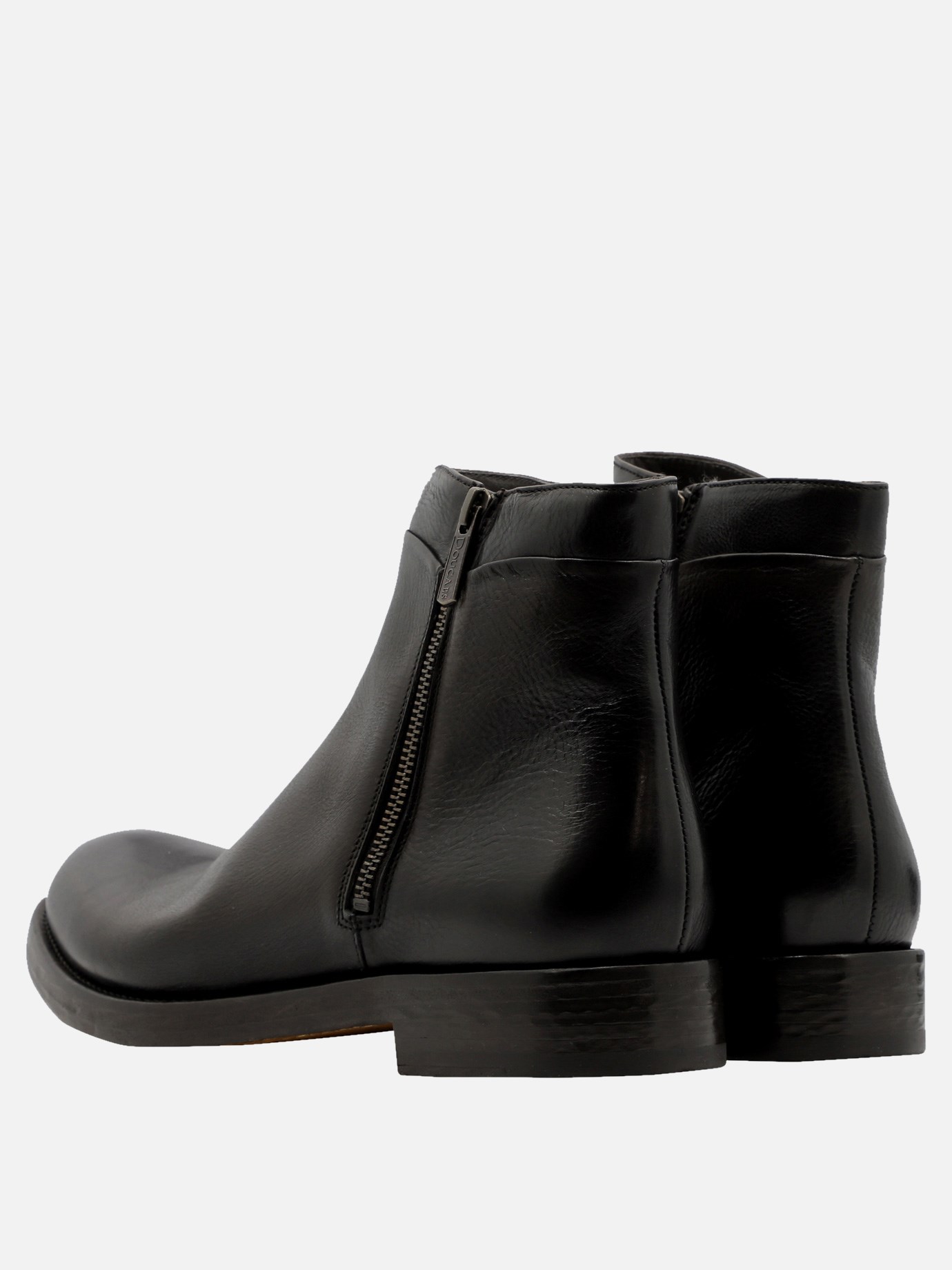 Ankle boots with side zip by Doucal's