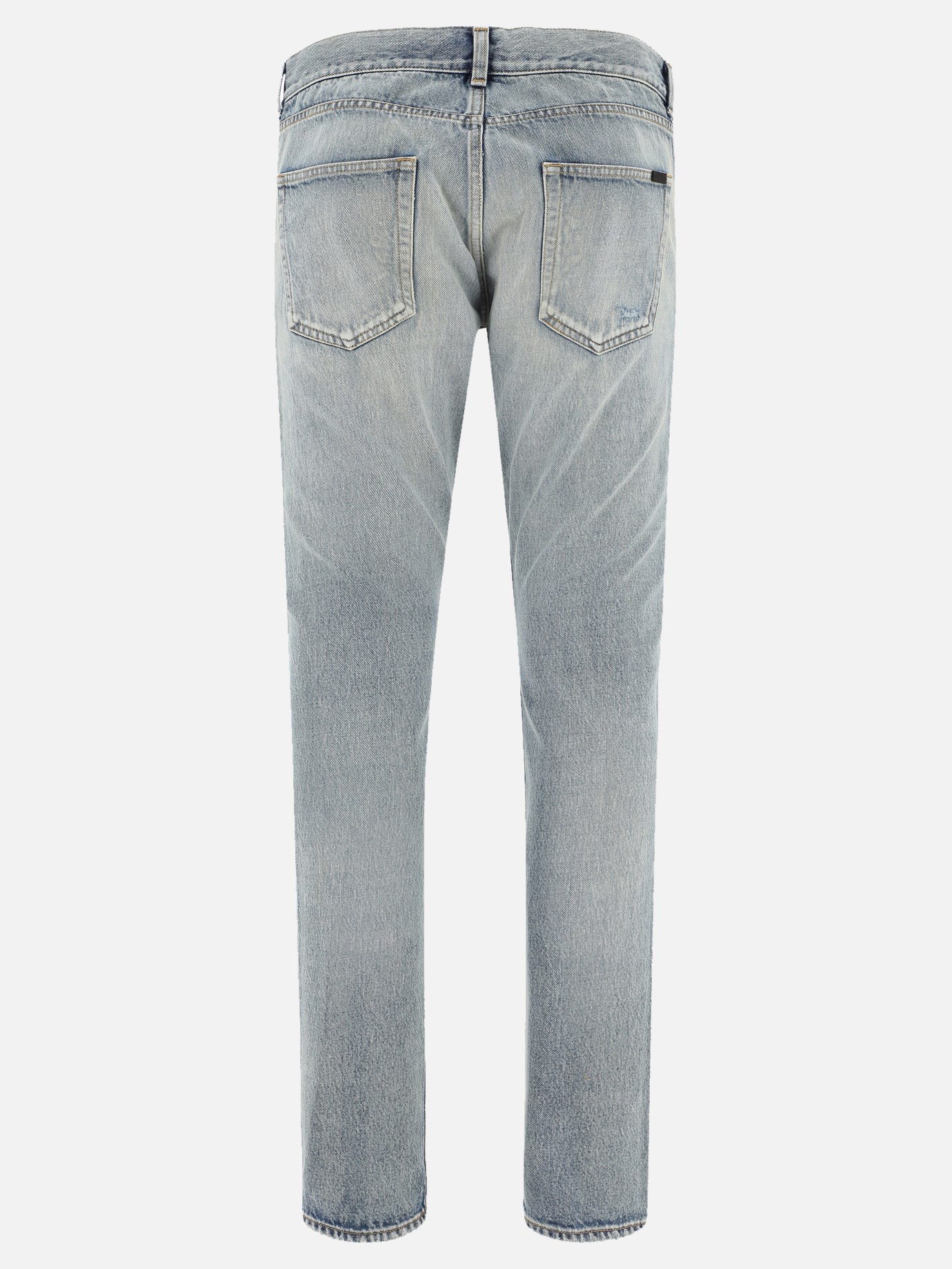 Distressed jeans by Saint Laurent