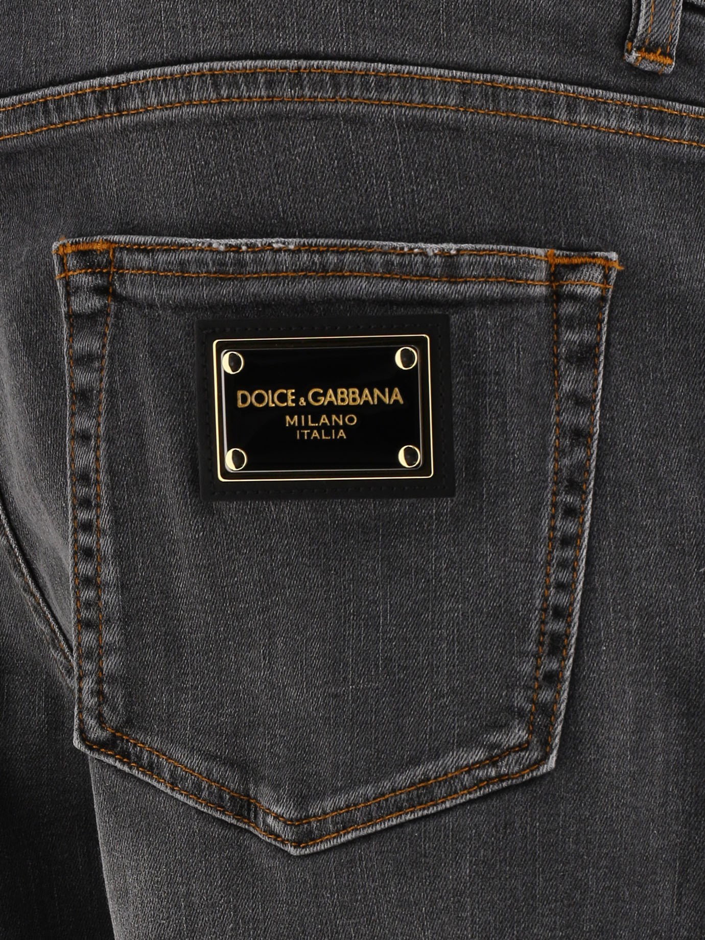Jeans with plaque by Dolce & Gabbana