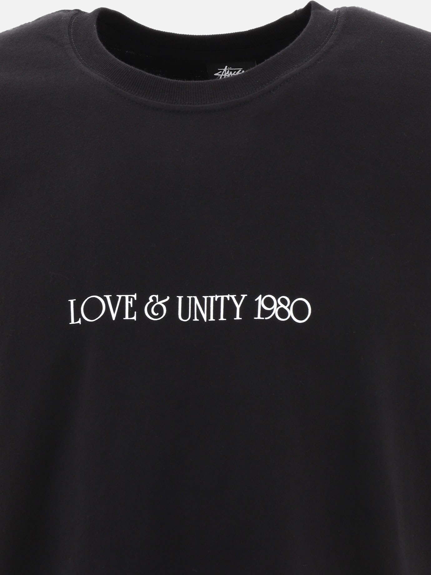 T-shirt  Love & Unity  by Stüssy